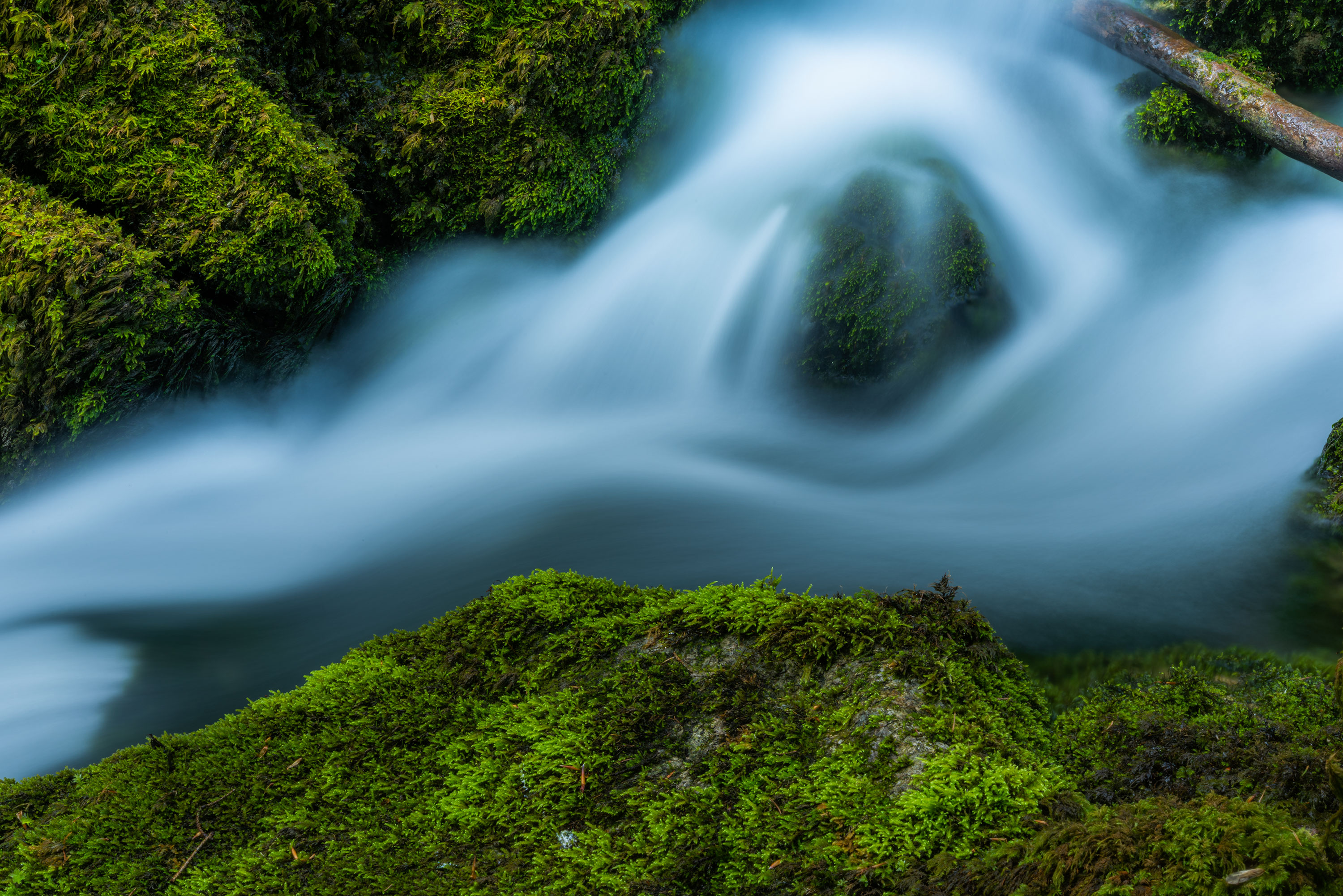 Close up of river and long exposure photography, in Switzerland. Image by Jennifer Esseiva.