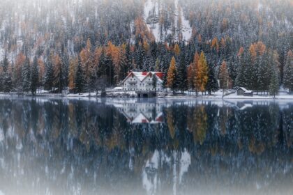 Experience the enchanting allure of a mystical house nestled within the snowy forests of the Dolomites, Italy. Set against the serene backdrop of Anterselva lake, this captivating scene is expertly captured through the lens of landscape photography virtuoso Jennifer Esseiva and her trusted Nikon D810 camera. Each image tells a tale of tranquility and wonder, as the ethereal beauty of the snowy forest reflects upon the still waters of the lake. Immerse yourself in the spellbinding charm of Italy's iconic landscape, brought to life with unparalleled artistry by Jennifer Esseiva. Explore the breathtaking imagery of this mystical house in the Dolomites, and let the beauty of nature's majesty inspire your soul.