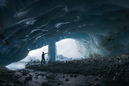Embark on a visual journey with this panoramic view of the Zinal Glacier Ice Cave nestled within the breathtaking Swiss Alps. Renowned photographer Jennifer Esseiva expertly captured this stunning landscape using her Nikon Z8, unveiling the dramatic allure of this natural marvel. Prepare to be mesmerized by the spellbinding vistas and intricate details, inviting you to immerse yourself in the awe-inspiring beauty of this majestic scenery.