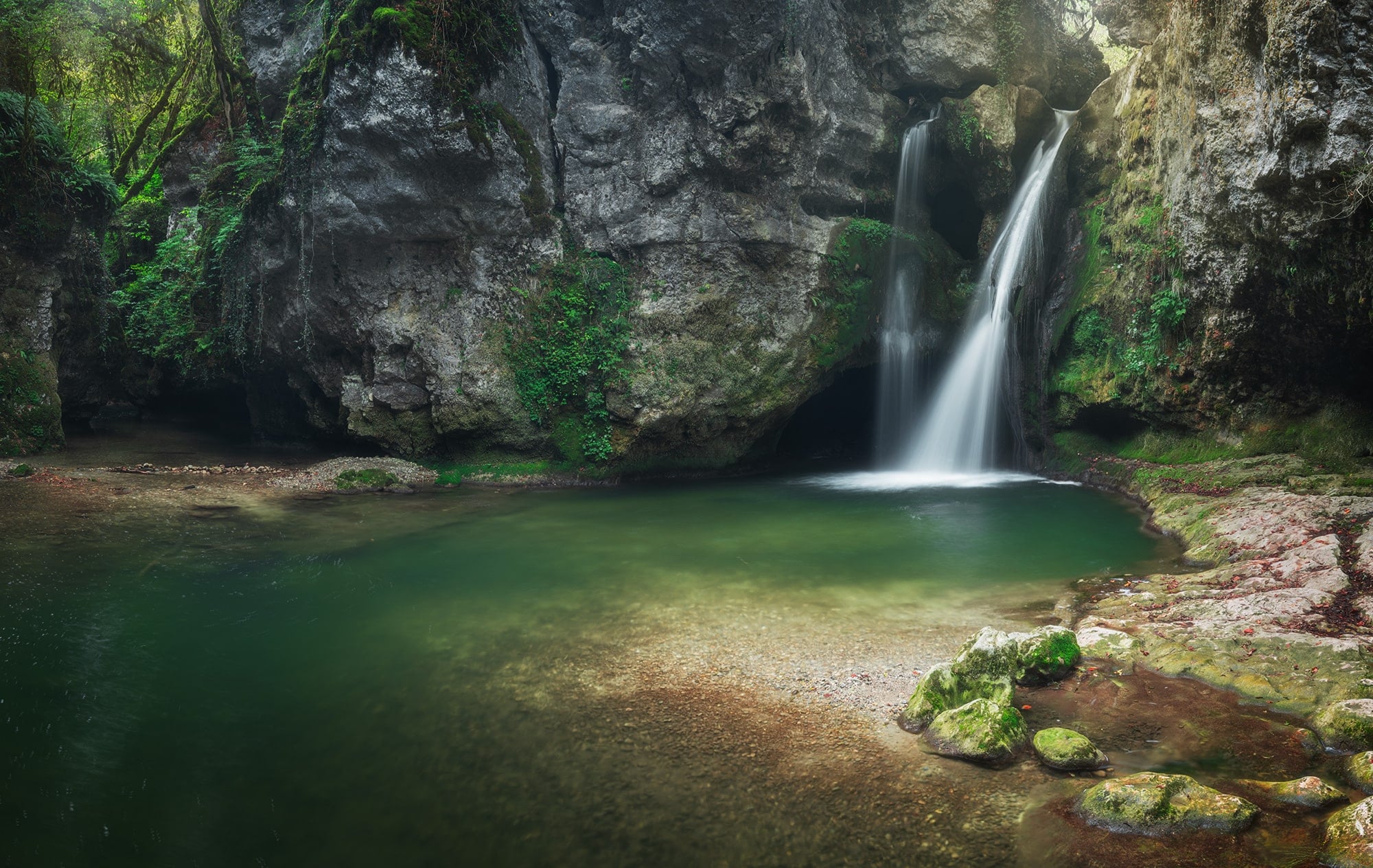 Step into a fairytale realm with this mesmerizing long exposure landscape photograph, capturing the enchanting beauty of the Tine of Conflens waterfall in Orbe, Switzerland. Nestled amidst a fairytale forest, this picturesque scene transports viewers to a world of wonder and tranquility. Immerse yourself in the serene flow of water and the lush greenery surrounding the waterfall. Experience the magic of nature through the lens of landscape photography in this captivating portfolio.