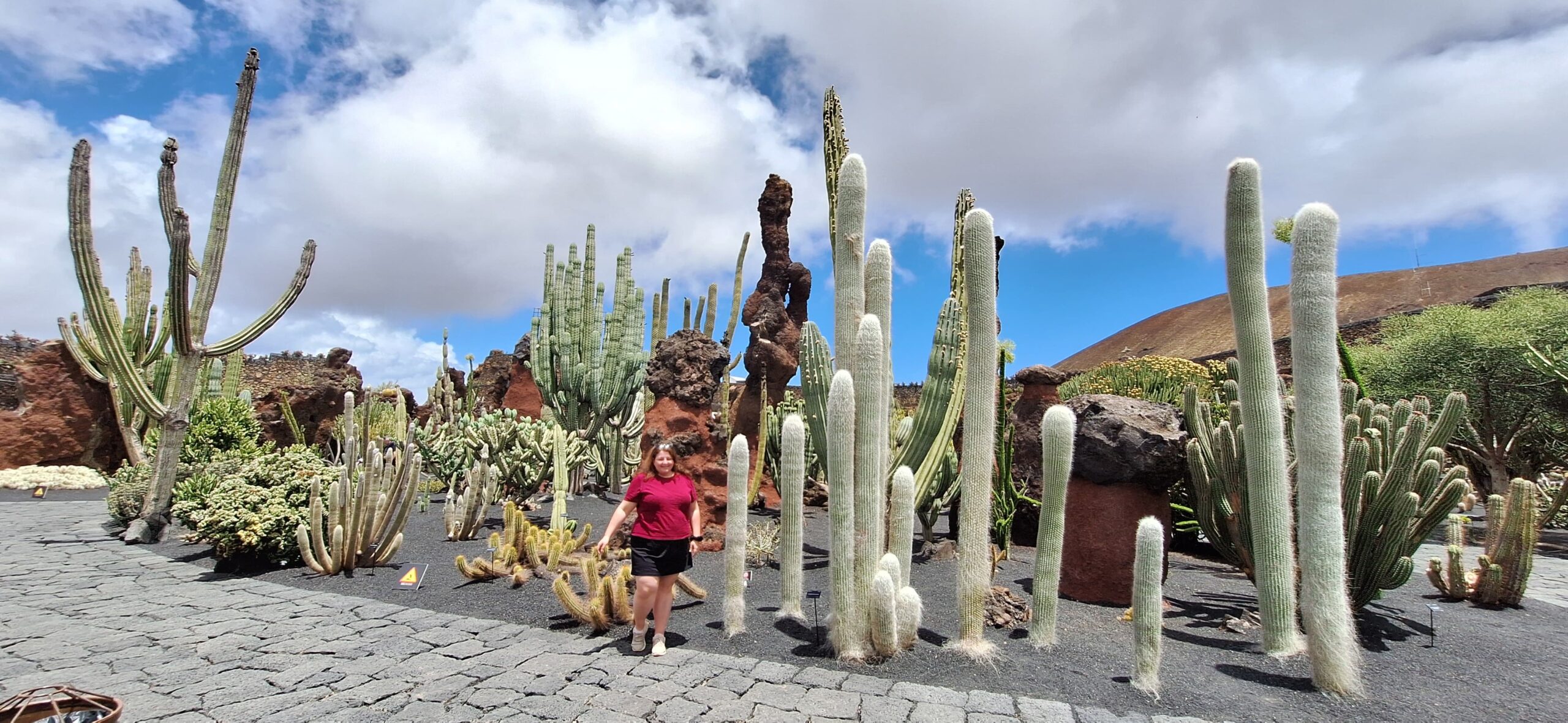 Jennifer Esseiva enjoying the Jardin de Cactus in Lanzarote, Canary Islands.